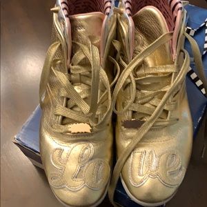 Leather gold sneakers . Excellent used condition